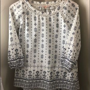 Cream and navy blouse